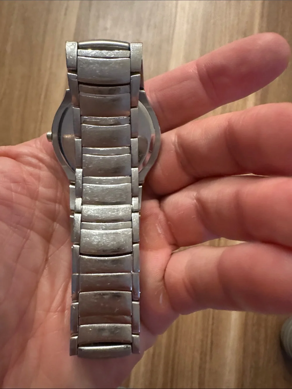 Movado Silver Bracelet Watch with Black Dial